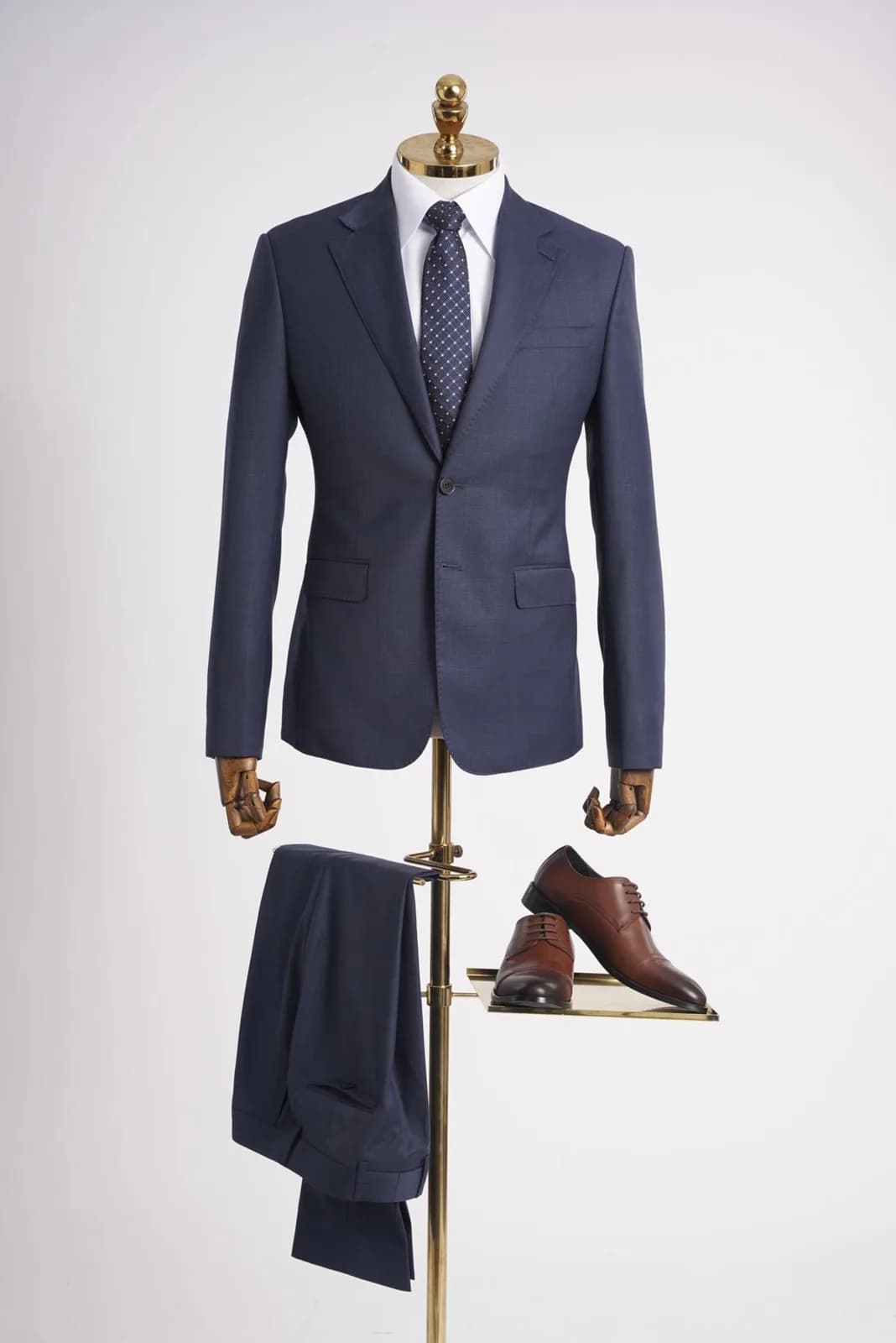 Mon Amie navy suit on a mannequin