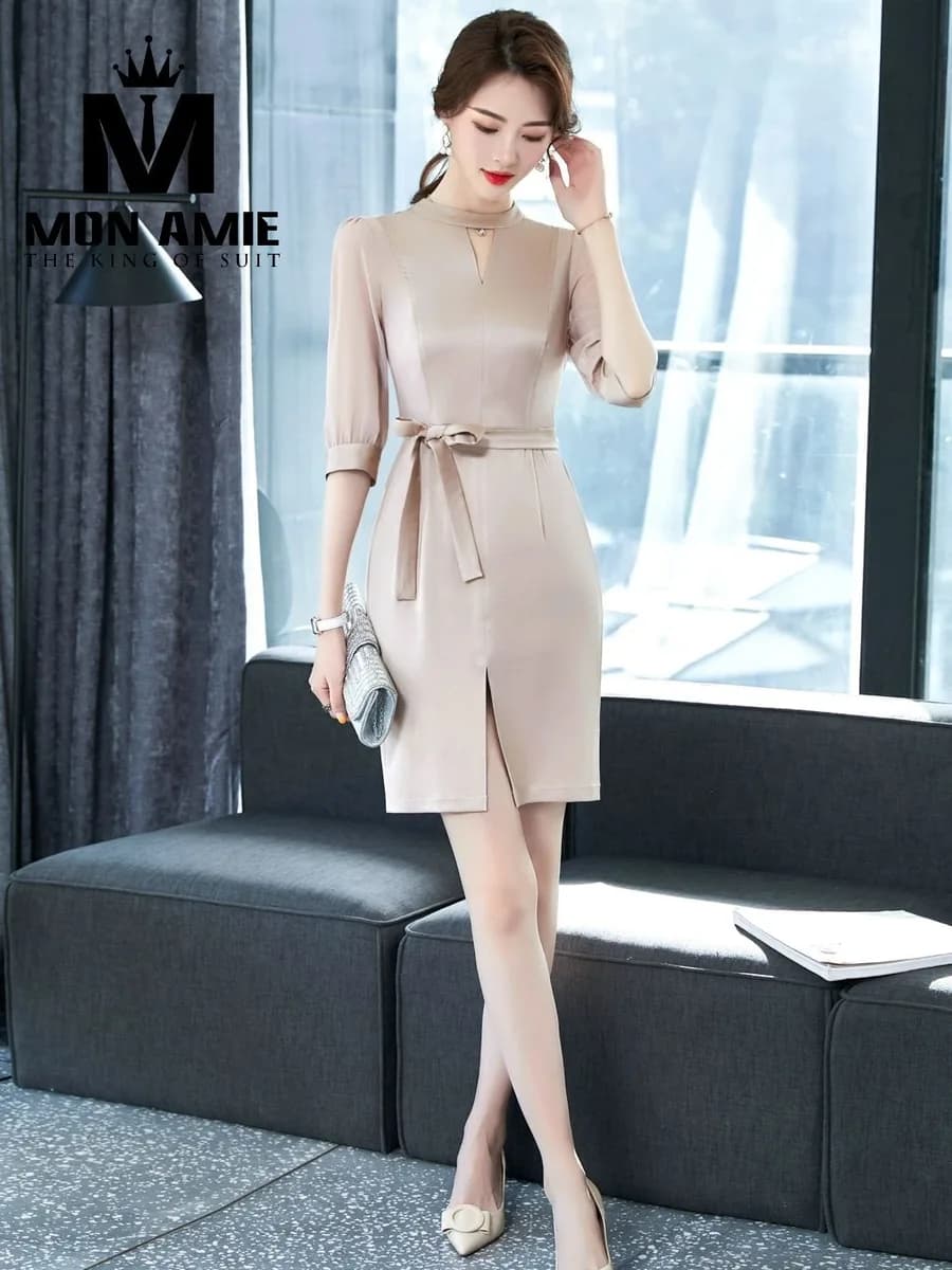 Đầm Be Champagne Cổ Trụ Khoét Thắt Nơ Eo Xẻ Tà Trước