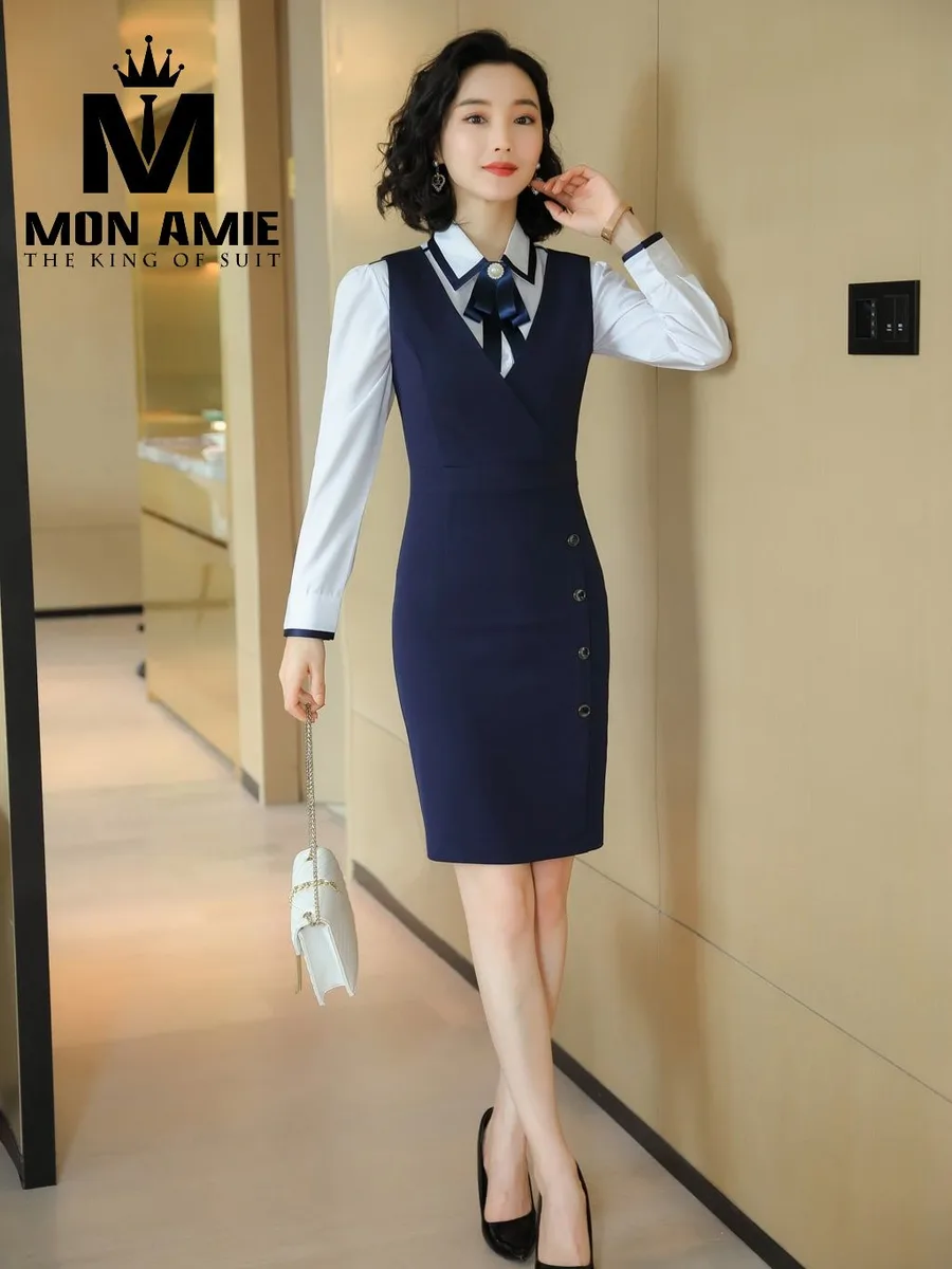 Navy V-Neck Pinafore Dress with Side Buttons over White Shirt