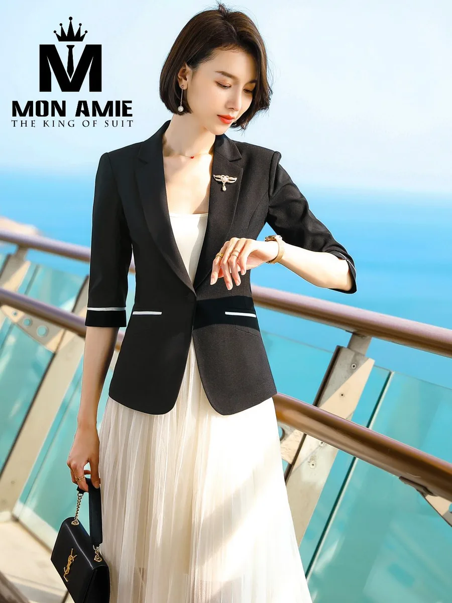 Black Blazer with White Piping over Cream Pleated Tulle Dress