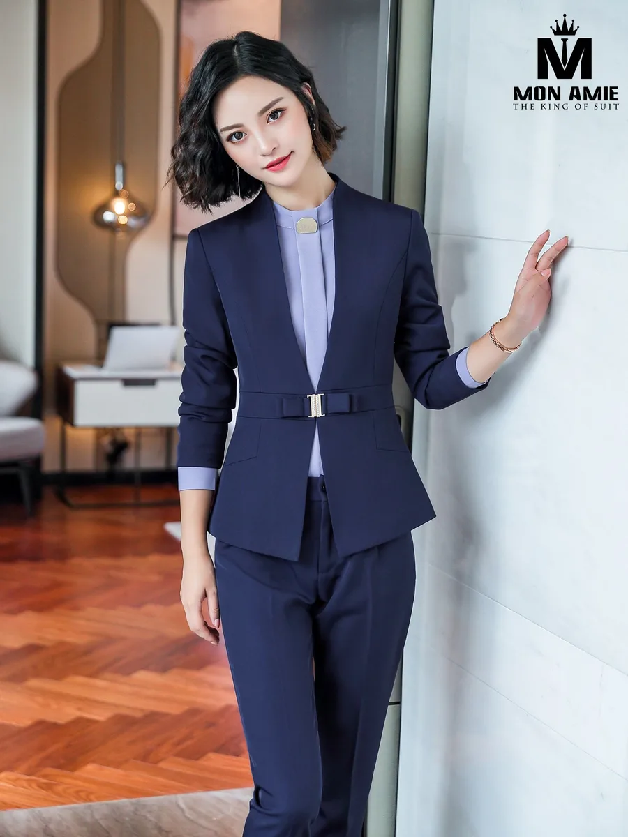 Navy Collarless Suit with Gold-Buckle Bow Belt