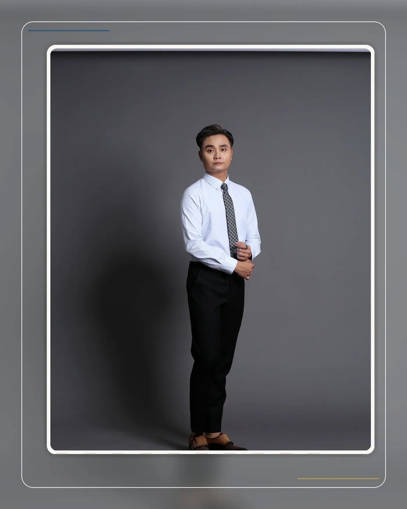A well-proportioned navy suit from shoulder to trouser line