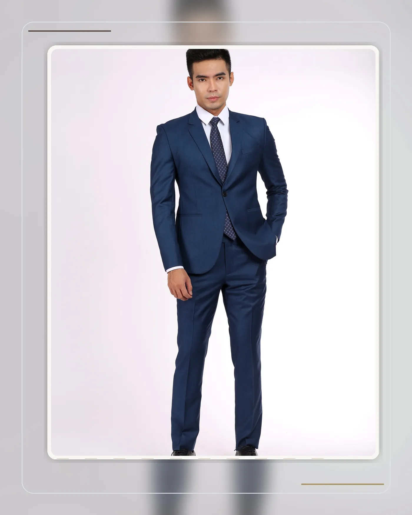 A well-fitted blue suit with smooth cloth showing proper, non-restrictive fit