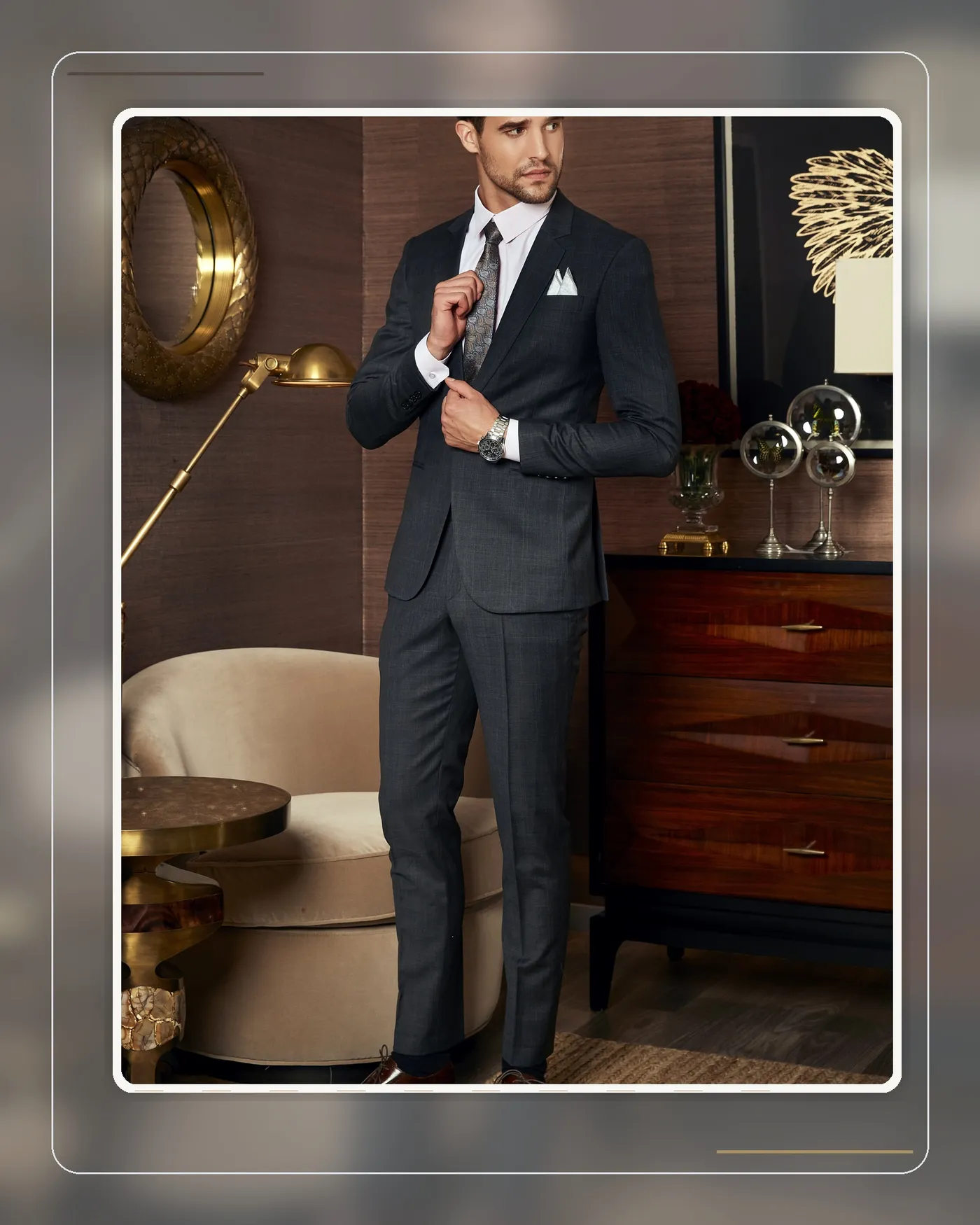 A full suit look seen from a distance — the test of whether sneakers blend into the outfit