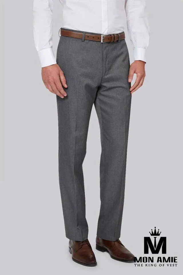 Plain light grey trousers, white shirt and brown shoes, a grey suit with brown shoes pairing